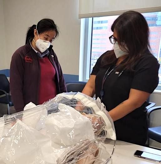 Nahreen right tests the SurgiField with debbie left from the Surgibox team. Photo credit: Atif Rakin, CTO at Surgibox