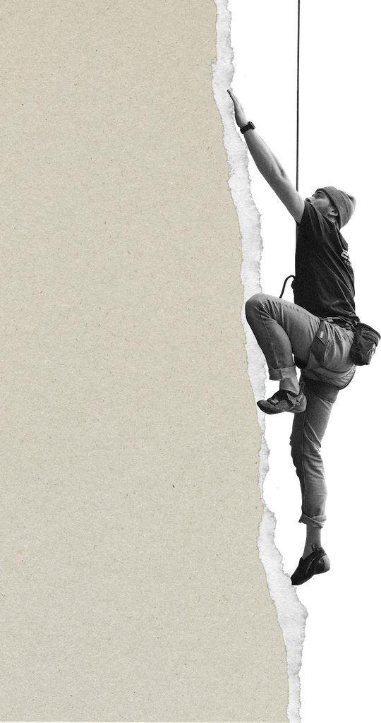 A climber scaling the torn edge of the page as if it were a rock face