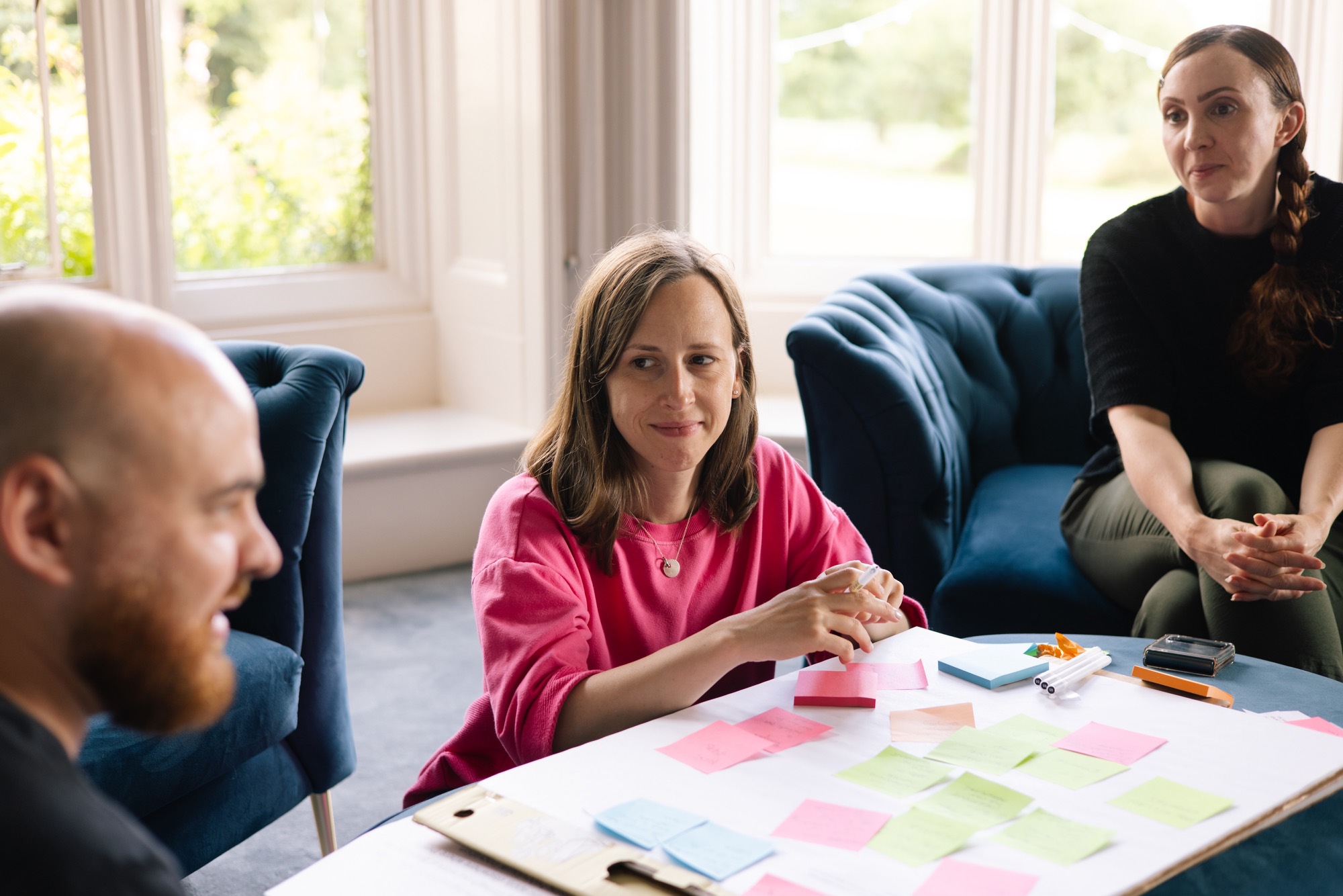 A Brink workshop in progress, ideas mapped across a table